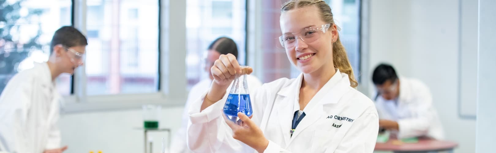 Aquinas College student in the science laboratory